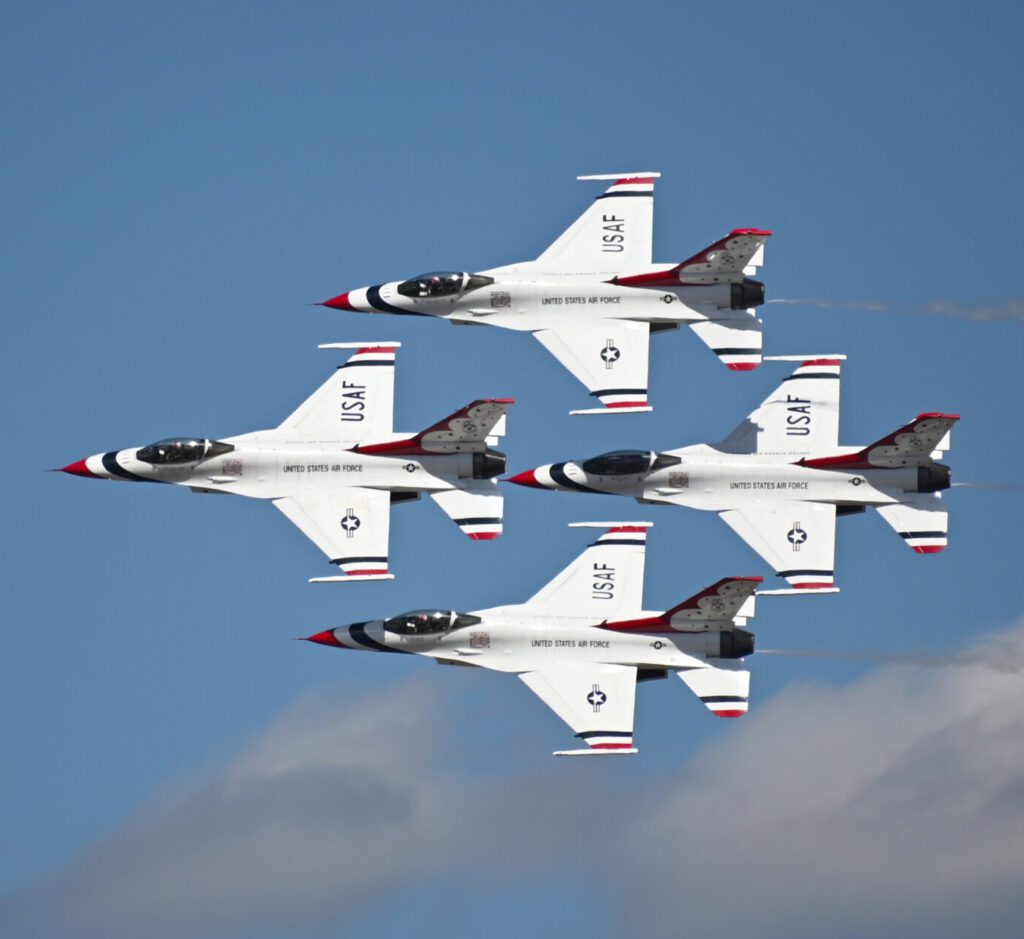 The USAF Thunderbird aircraft perform a four-ship aerial formation during the Wings Over Columbus 2022 Airshow March 25, 2022, on Columbus Air Force Base, MS. The Thunderbirds perform for people all around the world to display the pride, precision and professionalism the U.S. Air Force represents. (U.S. Air Force photo by Senior Airman Jake Jacobsen)